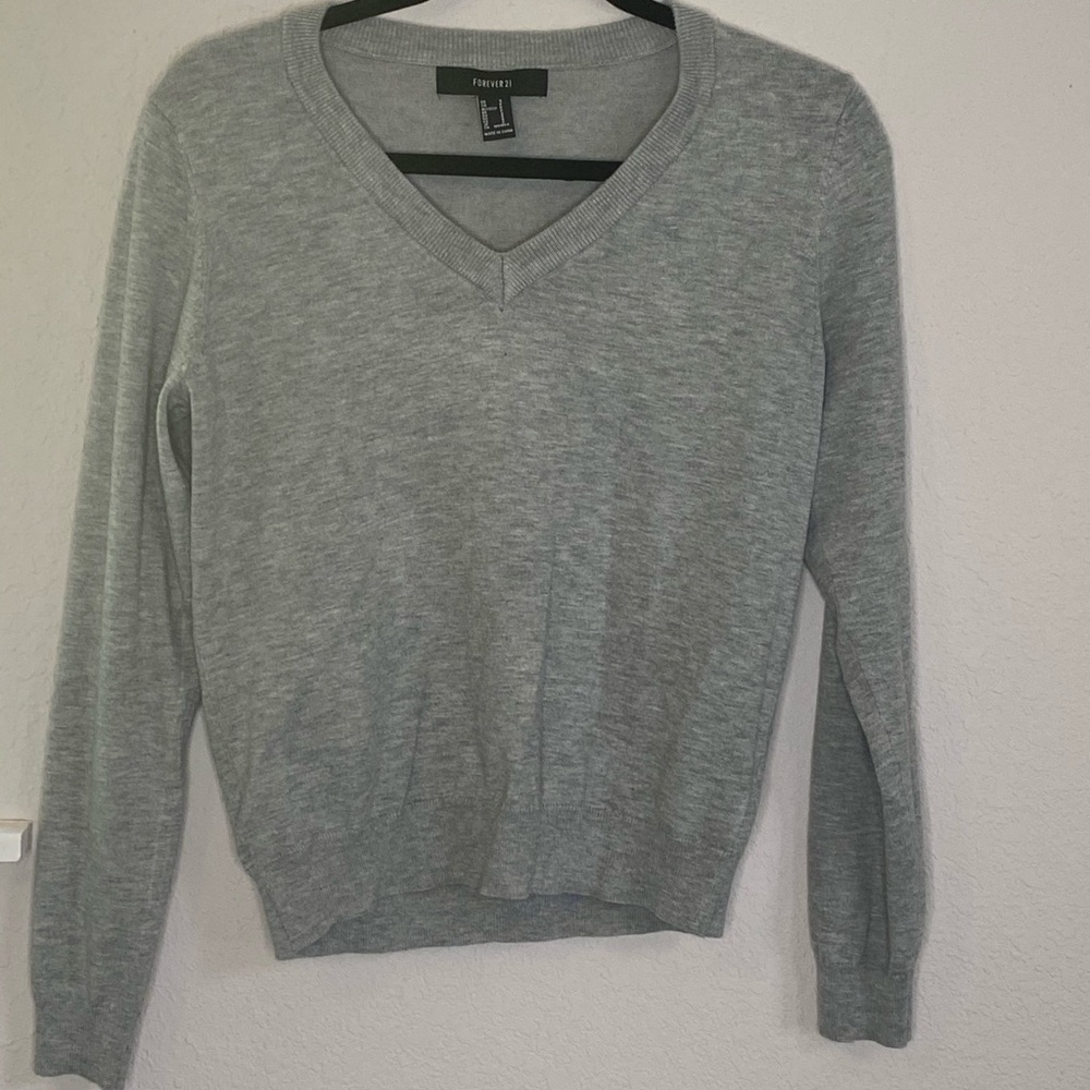 Gray V-neck sweater